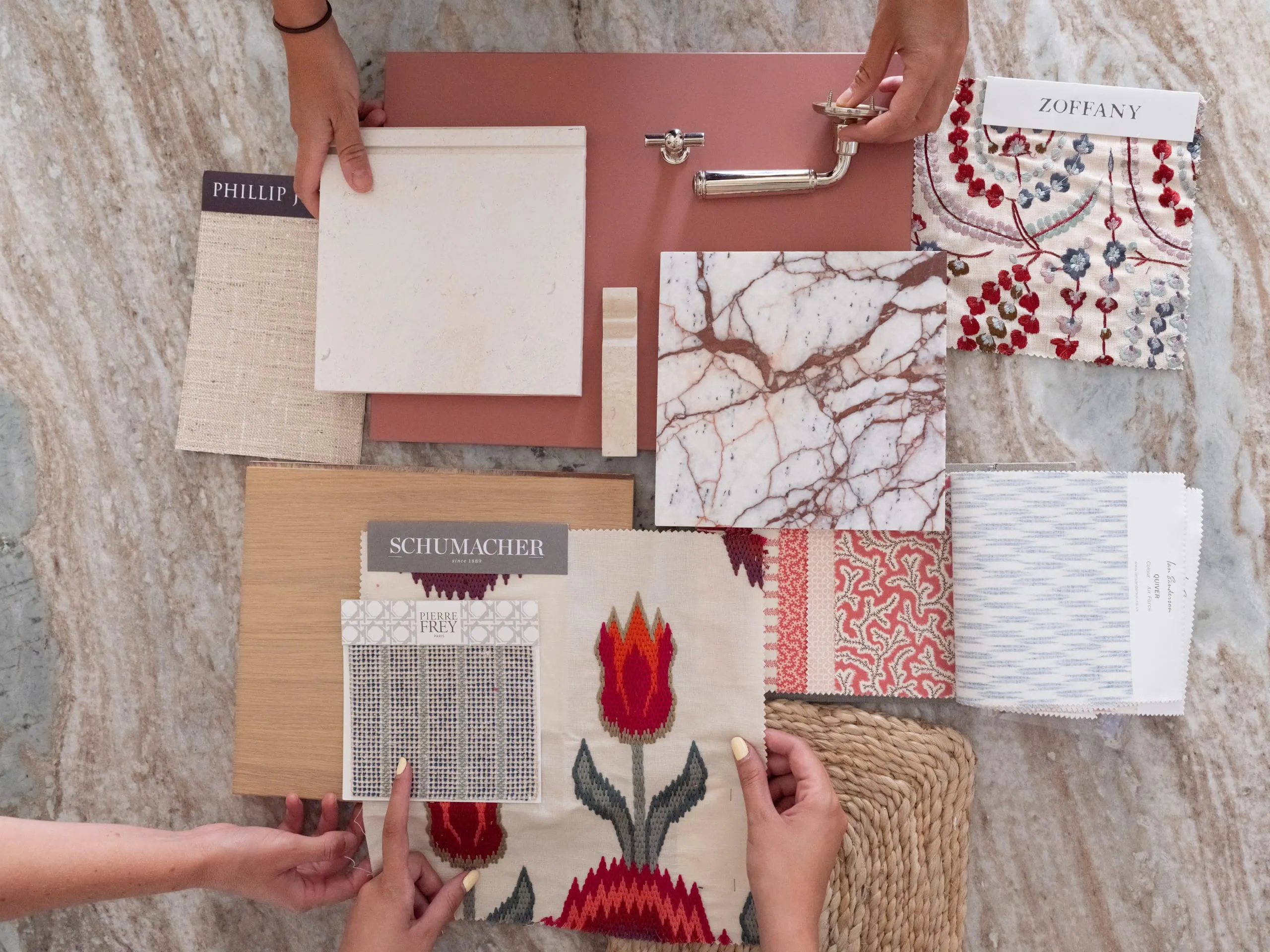 A selection of fabrics, wallpapers and materials for a project
